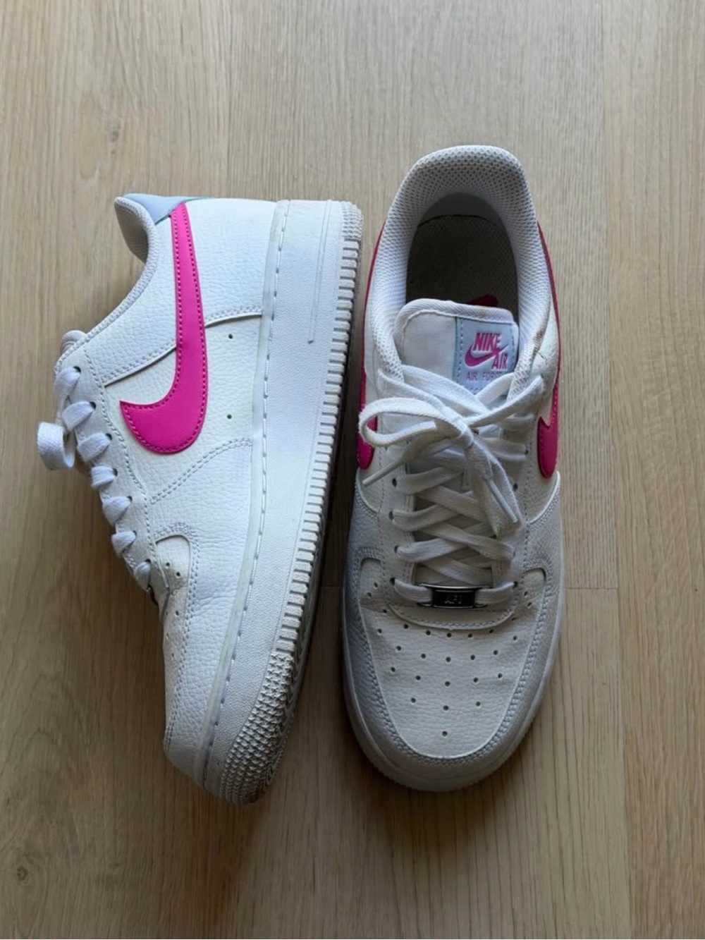 Nike AF1 White Sneakers with Pink Logo Detail